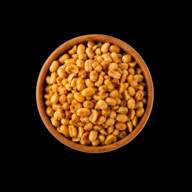A bowl of golden roasted peanuts